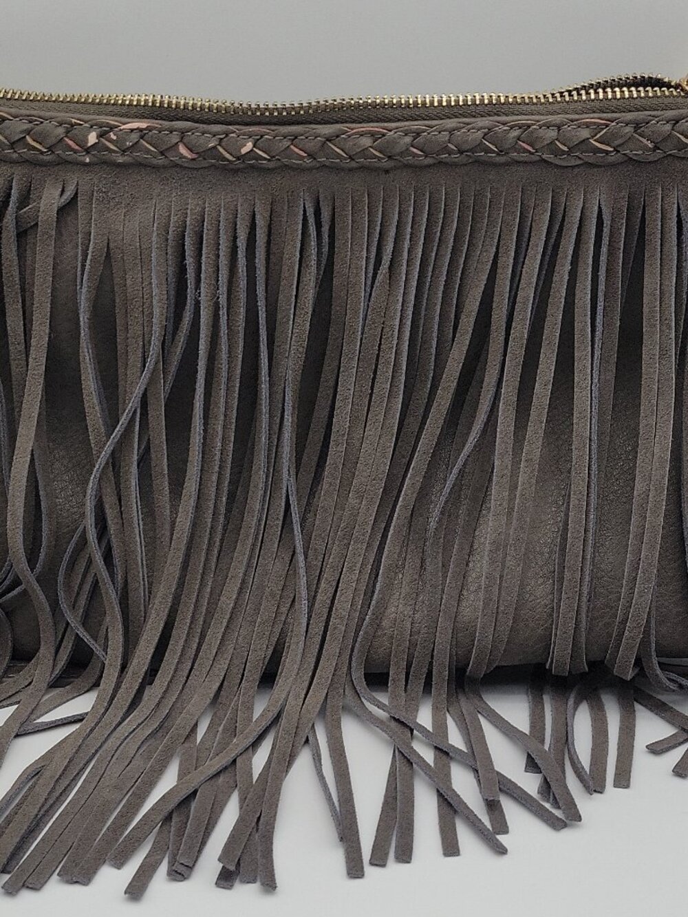 Moda Luxe gray fringe, braided trim, gold hardware, shoulder bag, zip closure
